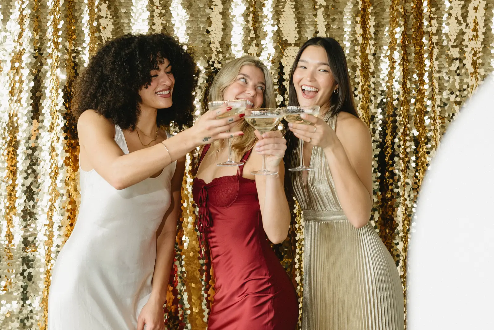 Guests raising a toast at the photo booth